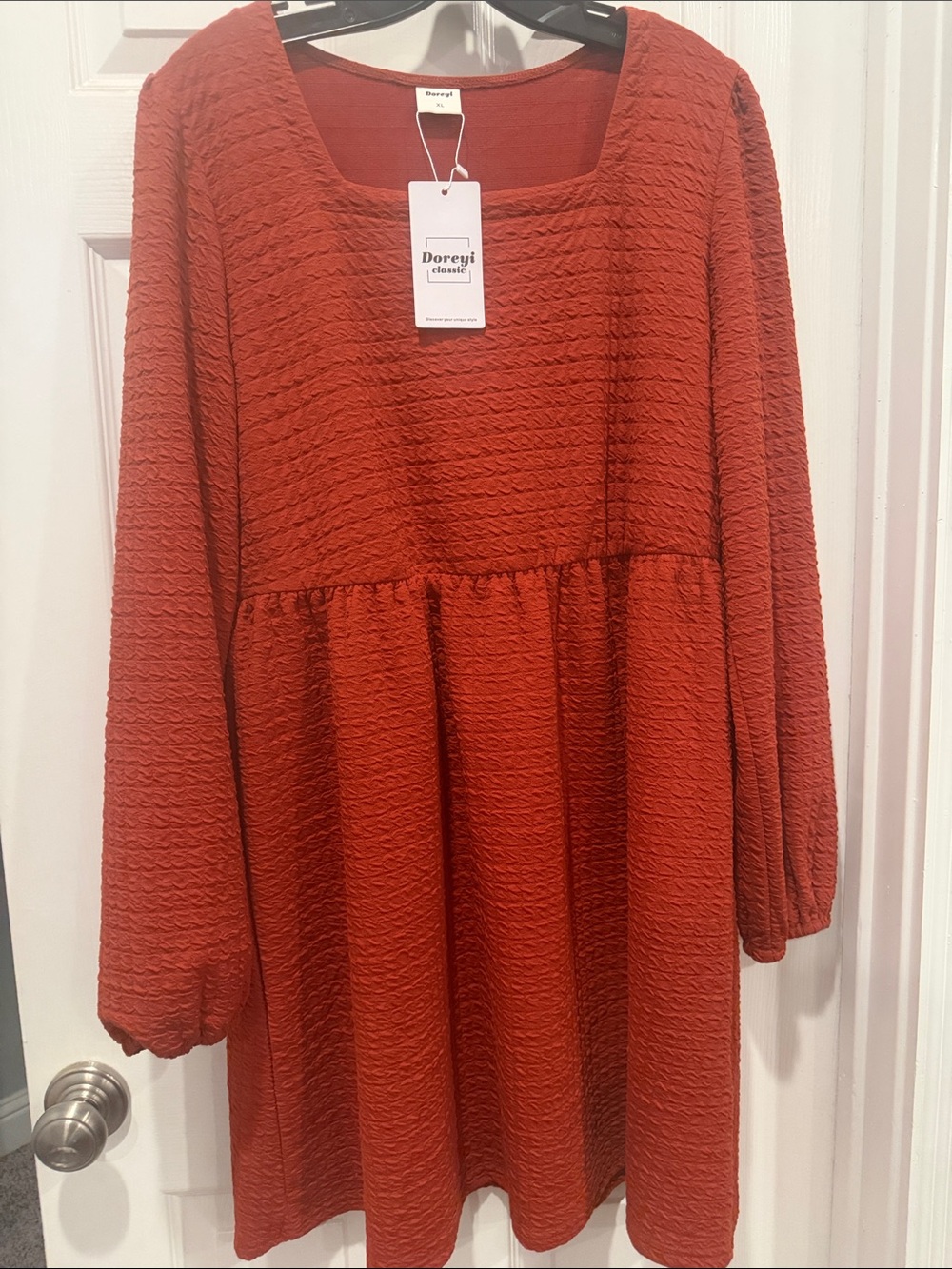 Doreyi Ribbed Babydoll Dress in Deep Rust